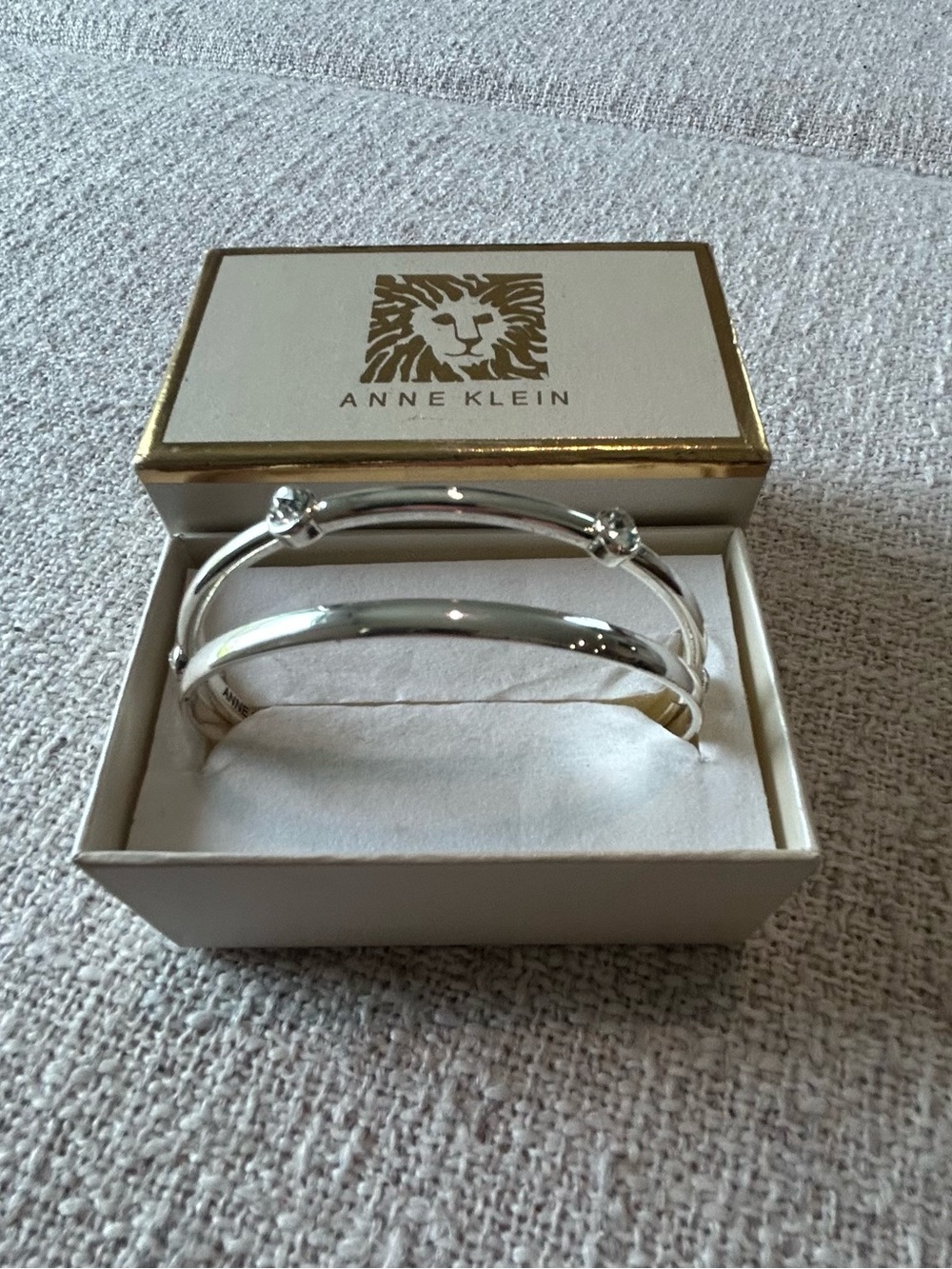 Anne Klein Shiny Silver 3-Piece Bangle Stack (one bracelet missing)